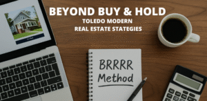 A desk with a laptop showing a "For Rent" listing, a notebook with "BRRRR Method" written on it, a coffee cup, and a calculator, illustrating modern real estate investment strategies.