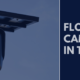 Flock license plate reader camera with text reading “Flock Cameras in Toledo.”