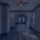 Clean, empty rental property interior with hardwood flooring and natural light.