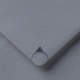 Close-up of a navy envelope with a subtle Buckeye Northwest Realty logo, representing updating your mailing address when moving.